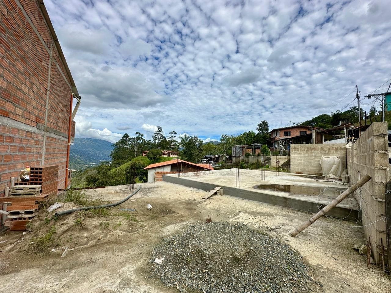 Gray House Under Construction with Lot for Sale in Girardota, El Totumo Neighborhood