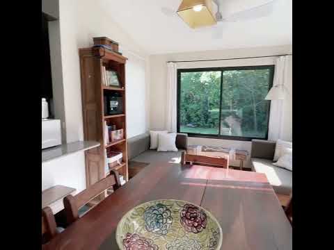 Beautiful property with 2 houses and a spacious garden with a pool