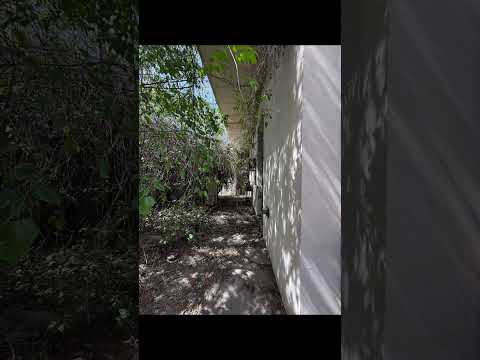Lot and HOUSE in need of complete renovation, with 3 commercial spaces