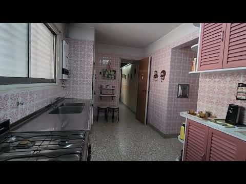 Beautiful apartment with a wrap-around balcony, garage, and 4 bedrooms in the heart of the Flores neighborhood