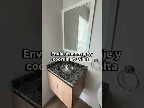 Brand-new apartment—half-floor unit with balcony, garage, and barbecue area