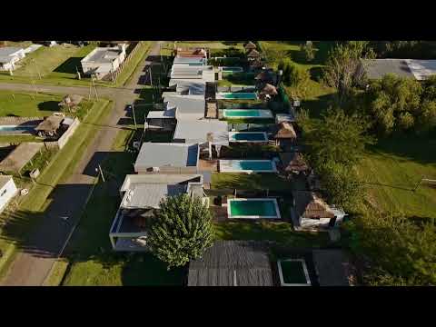 Land for Sale: Two-Bedroom House with Barbecue Area and Amenities in a Gated Community