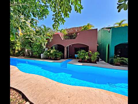 4-bedroom, 5-bathroom hacienda-style home with a private garden