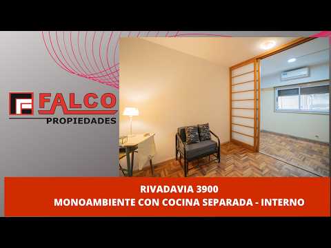 Interior studio apartment with a partition and a separate kitchen