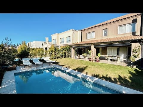 Impeccable 4-Bedroom House for Sale with Family House and Outbuilding in Nordelta, Tipas Neighborhood