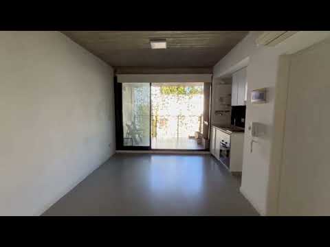 Split-level studio apartment with balcony, patio, garden, and pool in Chacarita