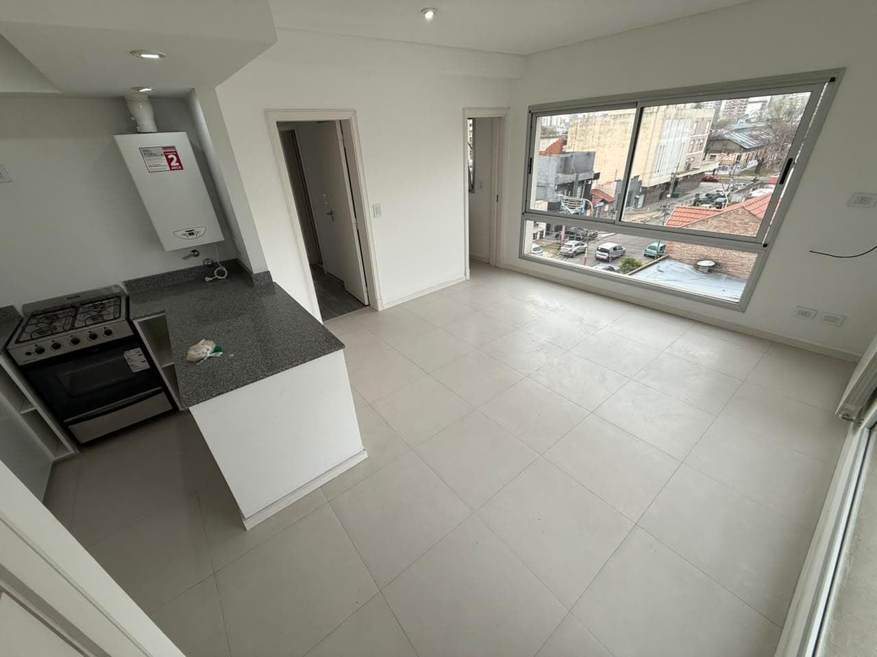 VENTA DEPARTAMENTO 2 AMBIENTES CON COCHERA Y SUM EN QUILMES