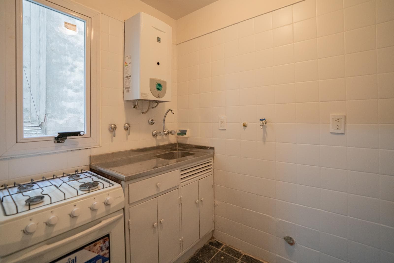 Interior studio apartment with a partition and a separate kitchen