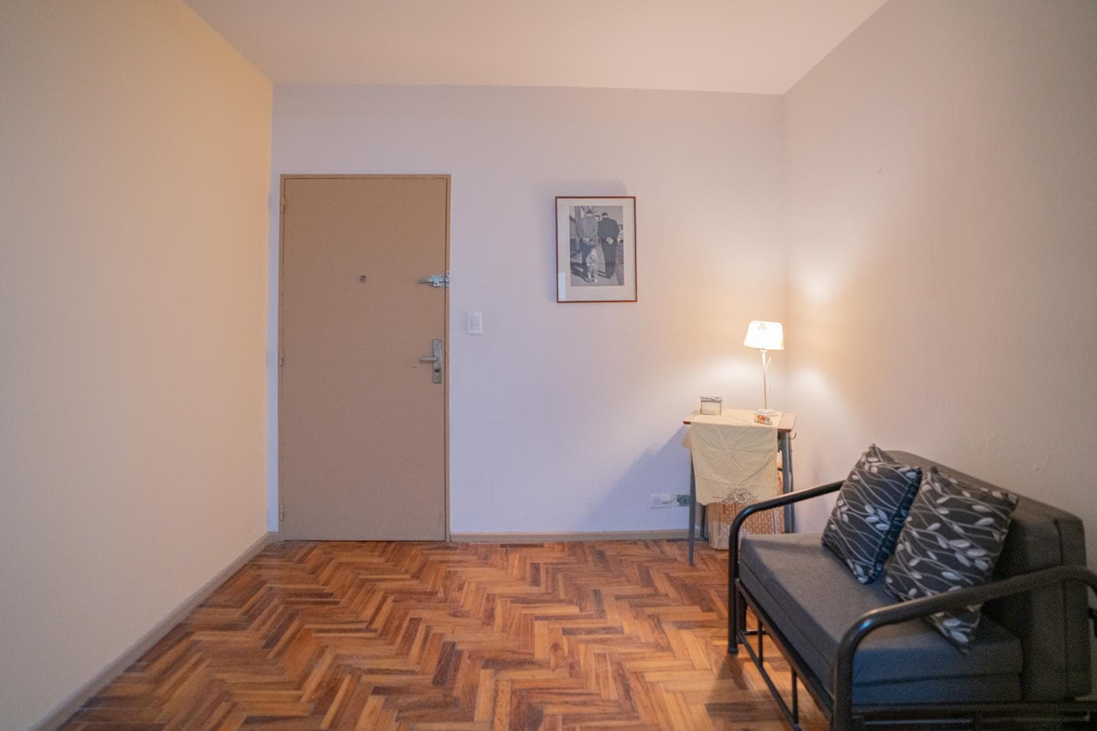 Interior studio apartment with a partition and a separate kitchen