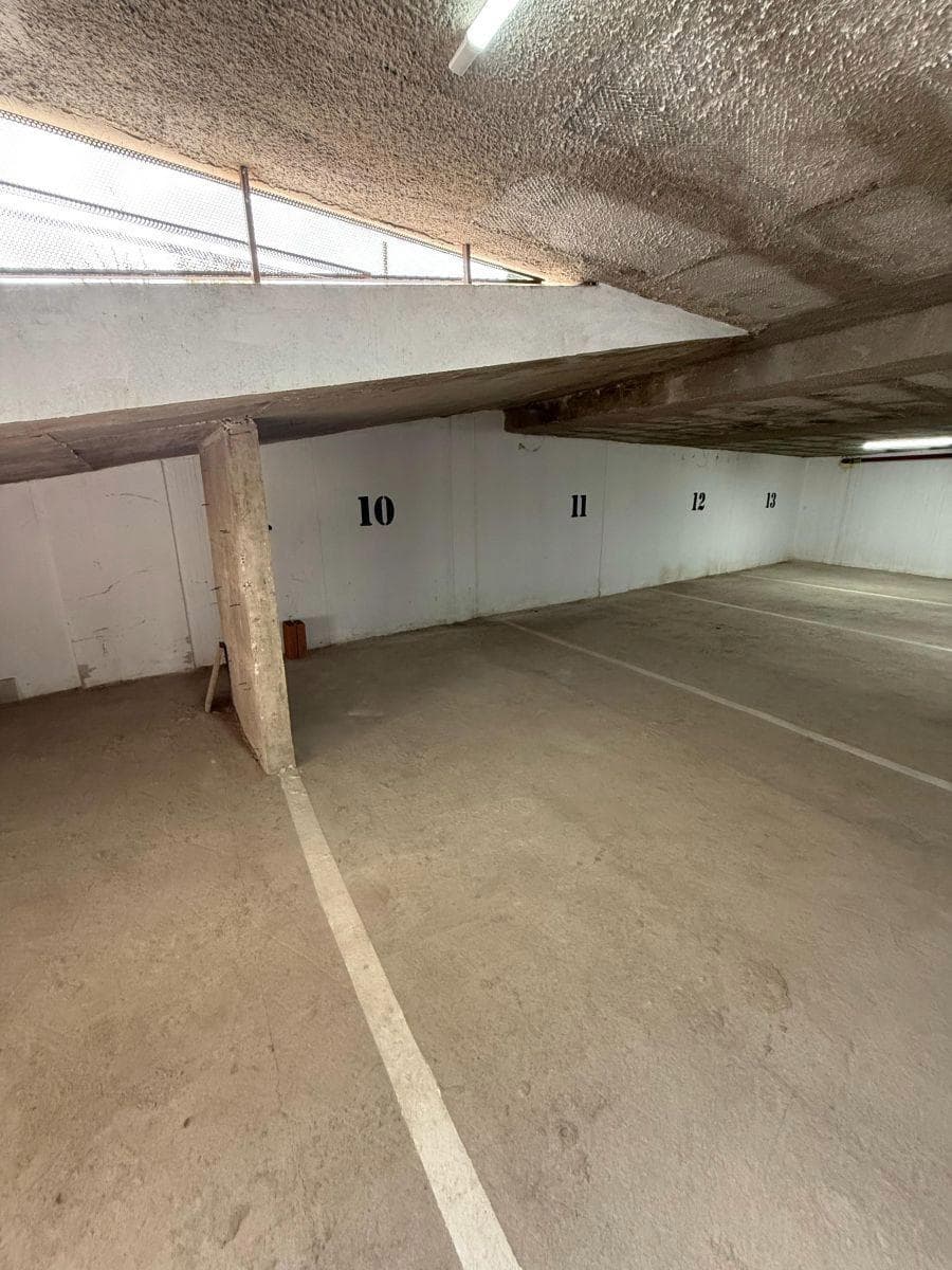 Covered parking garage on Av. Rogelio Nores Martínez — Barrio Jardín