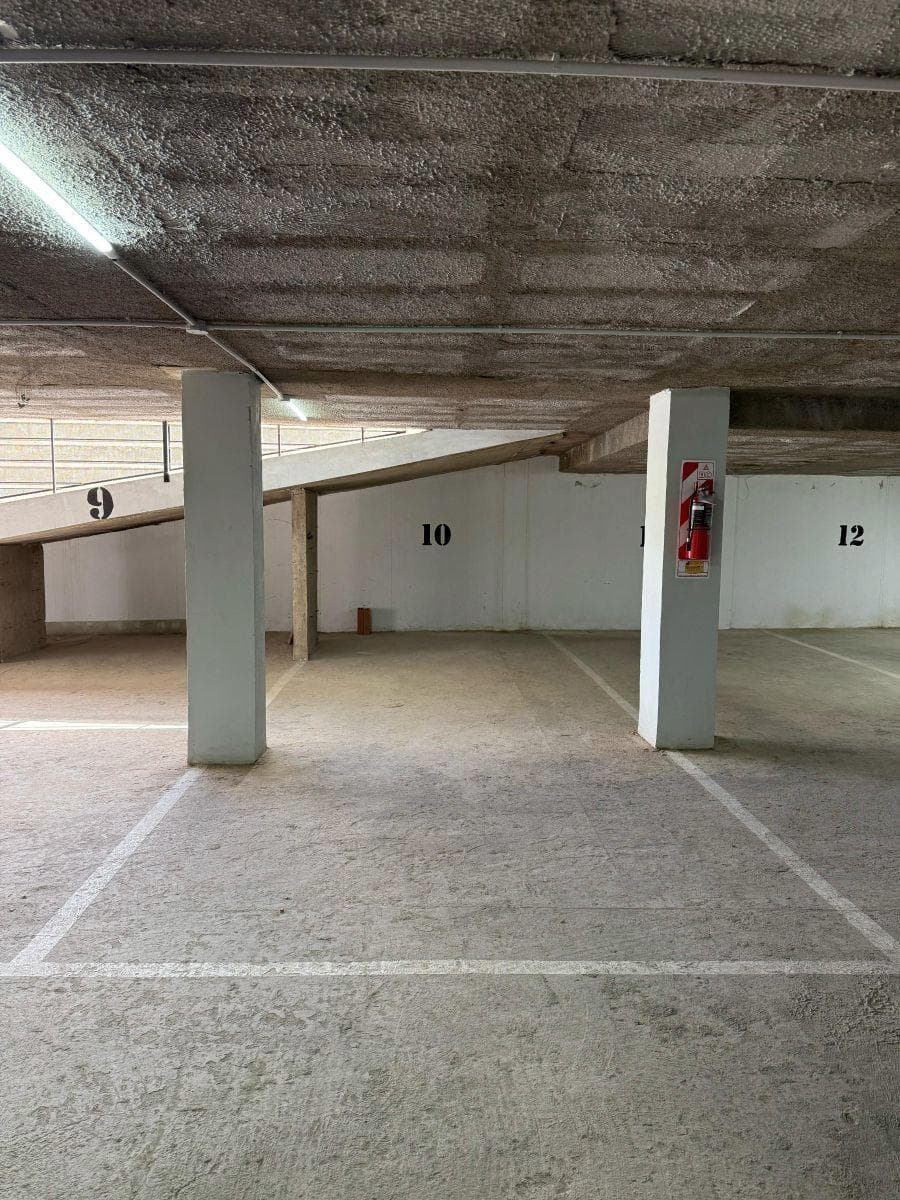 Covered parking garage on Av. Rogelio Nores Martínez — Barrio Jardín