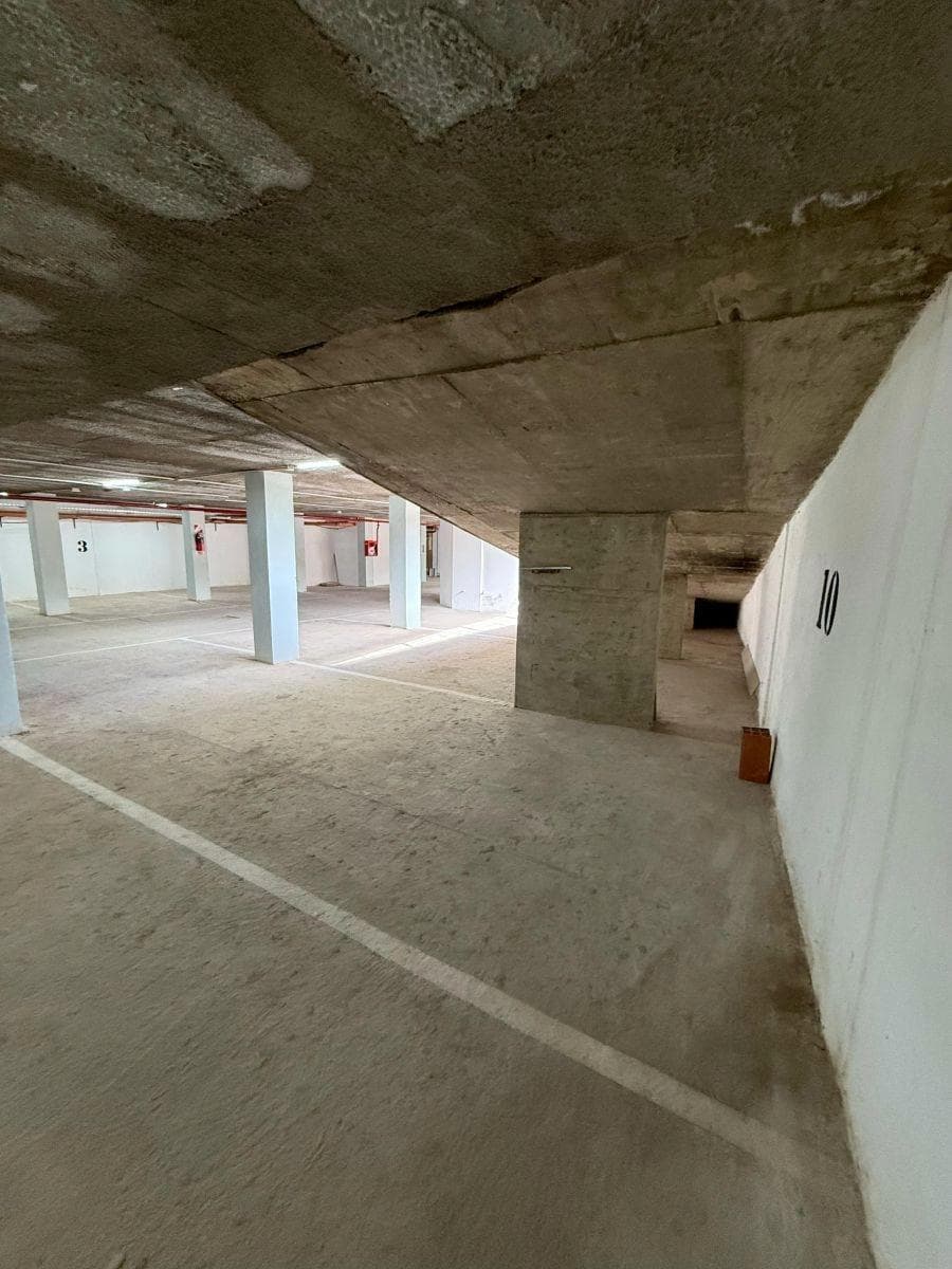 Covered parking garage on Av. Rogelio Nores Martínez — Barrio Jardín