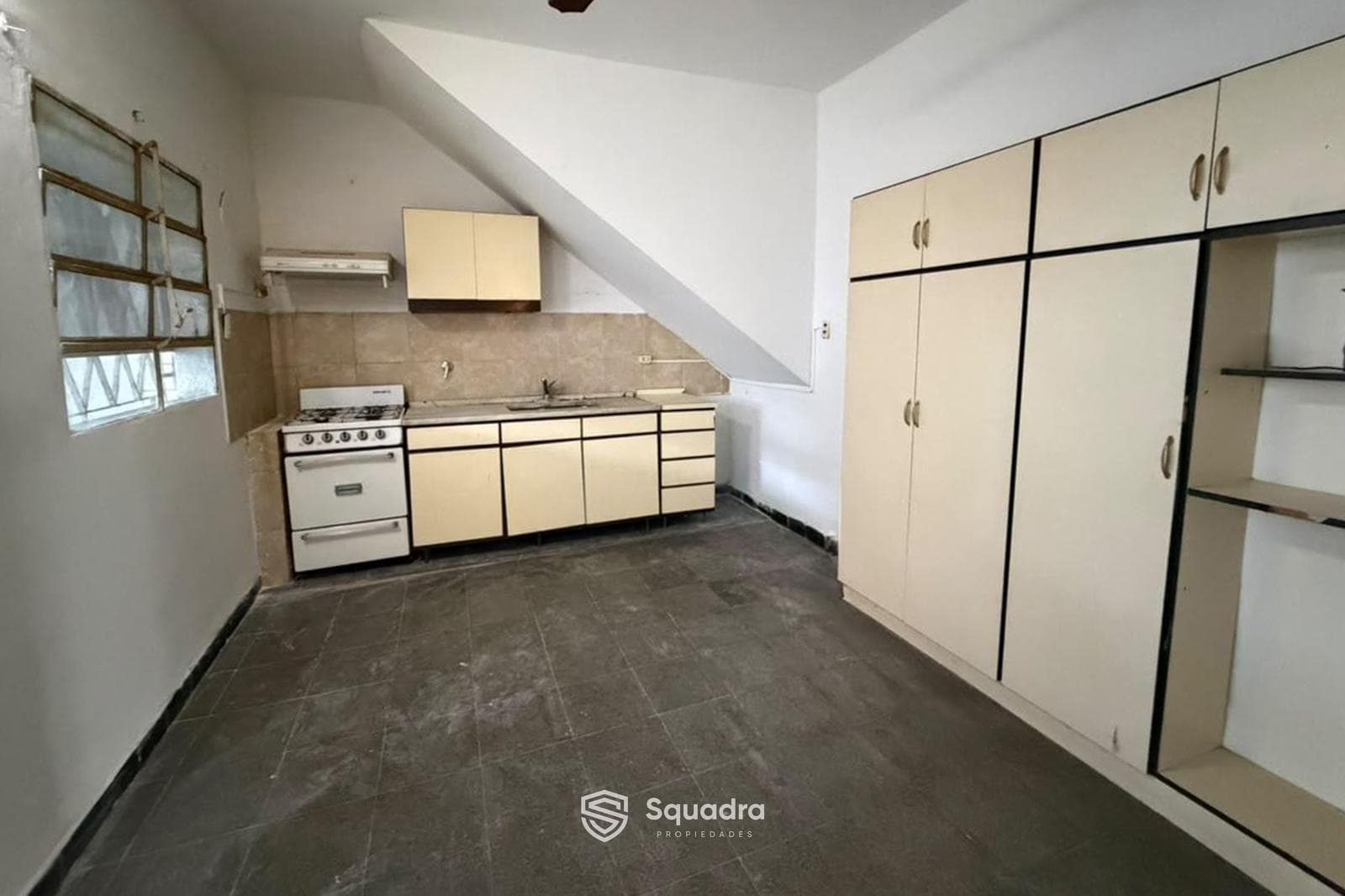 FOR SALE - 2-Bedroom House on a Main Street, with Garage - Arroyito Neighborhood, Rosario - QUALIFIES FOR A LOAN.