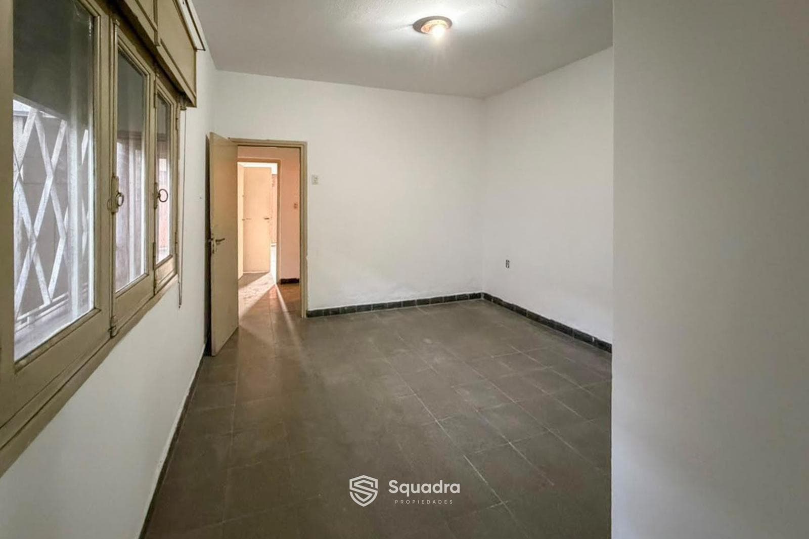 FOR SALE - 2-Bedroom House on a Main Street, with Garage - Arroyito Neighborhood, Rosario - QUALIFIES FOR A LOAN.