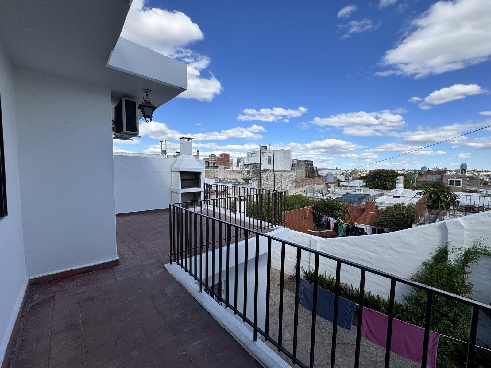 3-bedroom apartment with a balcony and a terrace with a grill in General Paz