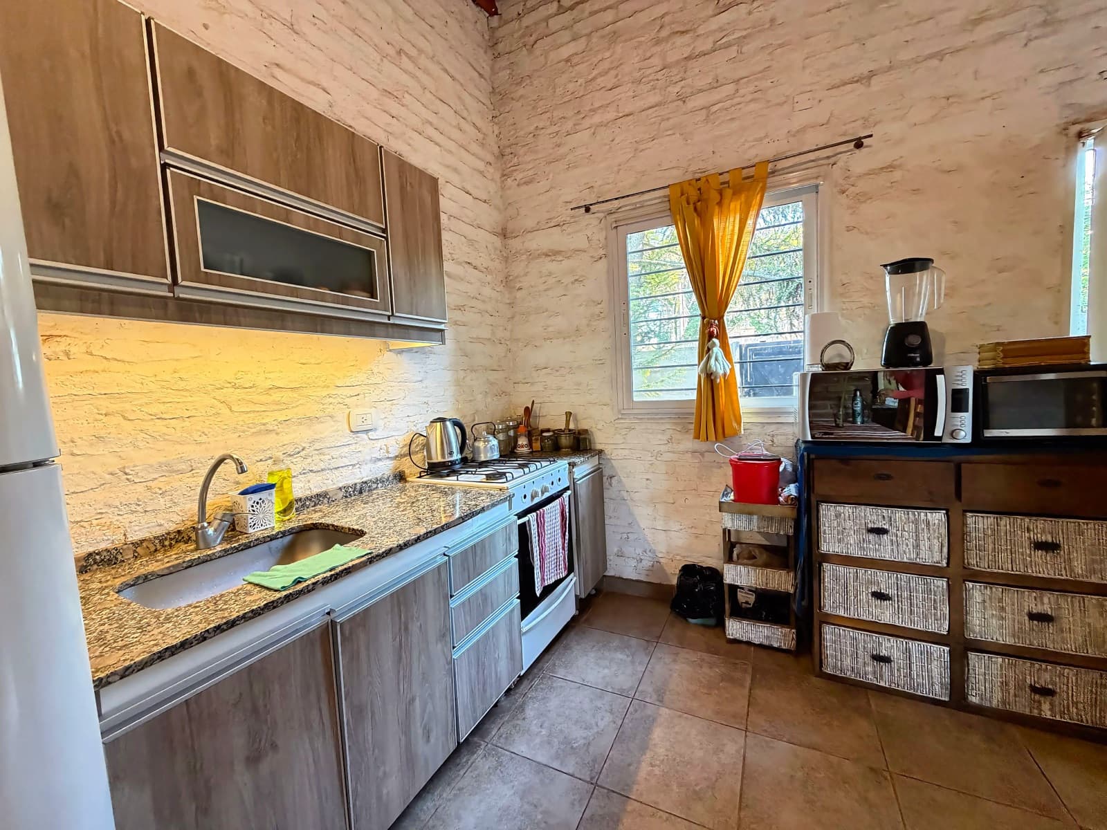 Venta Lote de 990 M² con Dos Casas en General Rodriguez