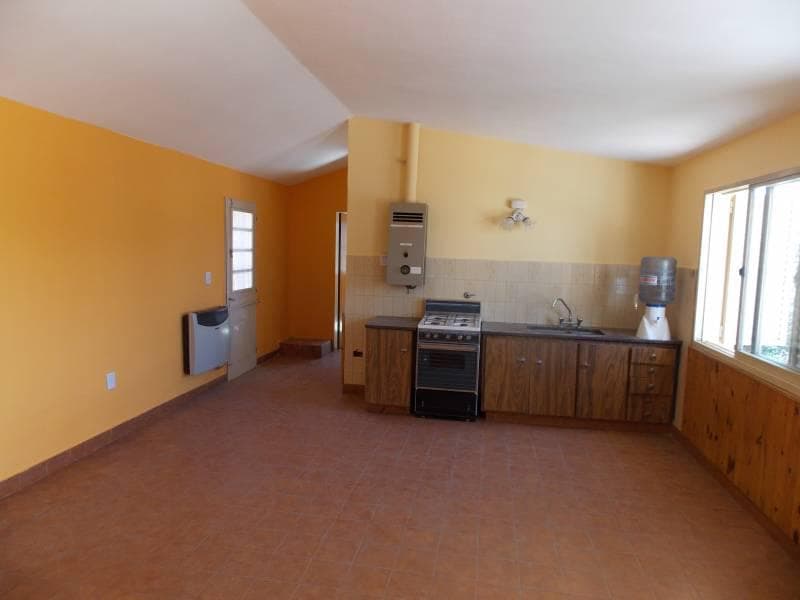 Chalet for sale in a prime residential location with panoramic views in the city of La Falda, consisting of: living room, dining room, and kitchen; one bedroom; bathroom; laundry room; garage; and barbecue area.