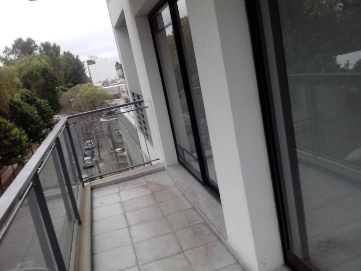 Across from the park, there is a terrace with a pool and a grill.