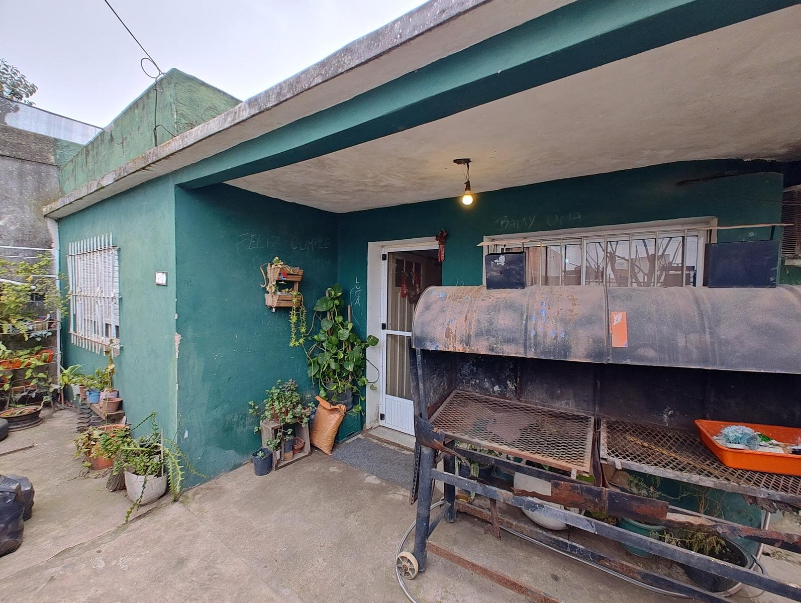 A very nice property with a house in the front and an apartment for sale in G Catan