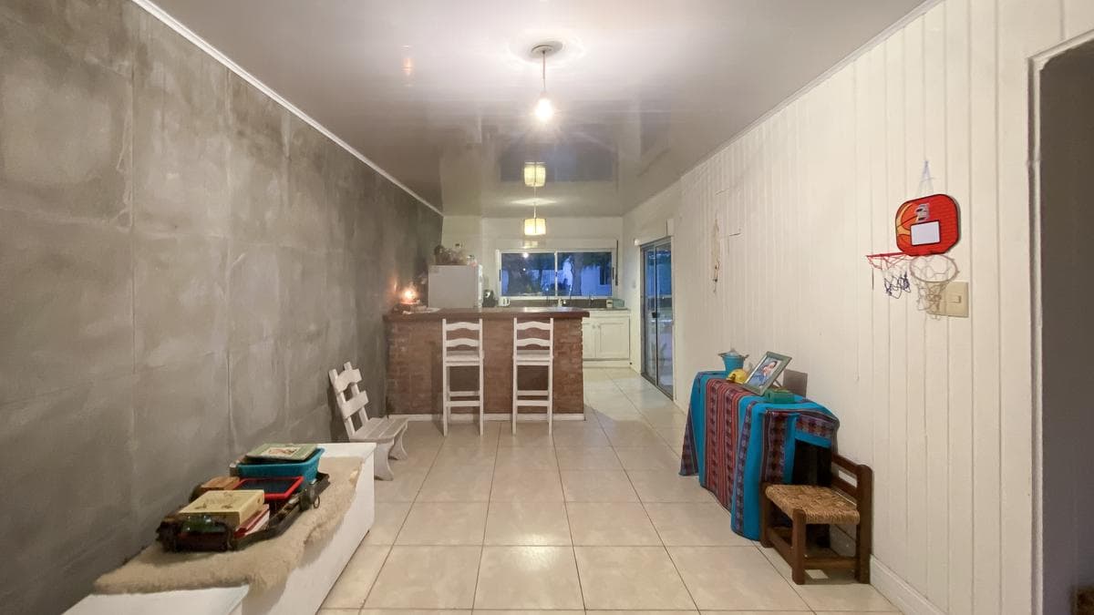 Two-bedroom house for sale with a spacious patio in San Carlos, Maldonado.
