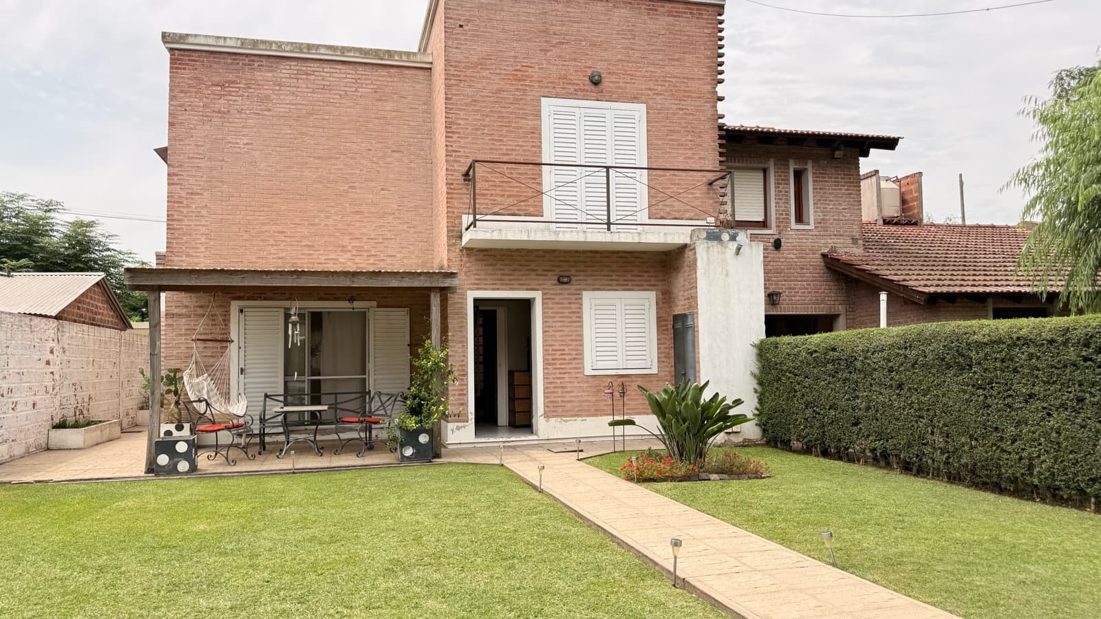 A beautiful two-story house on a paved lot is for sale—it will steal your heart!