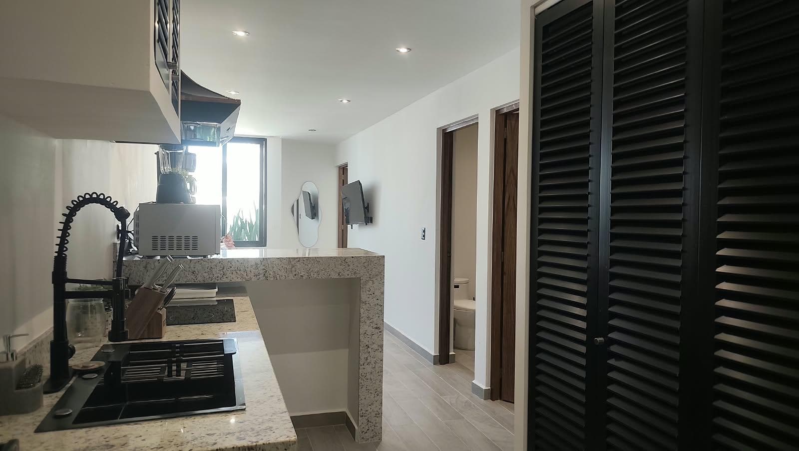 FURNISHED 2-BEDROOM APARTMENT FOR SALE IN PLAYA DEL CARMEN NEAR THE BEACH
