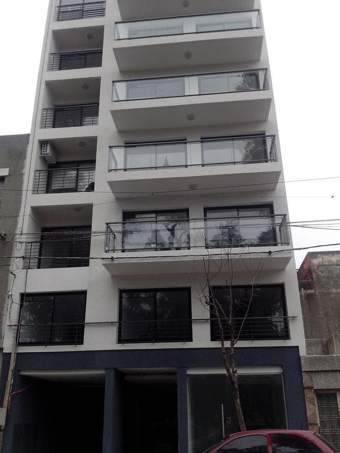 Across from the park, there is a terrace with a pool and a grill.