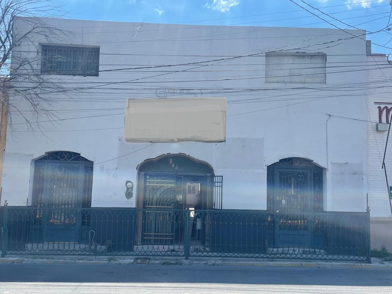 House on a major avenue