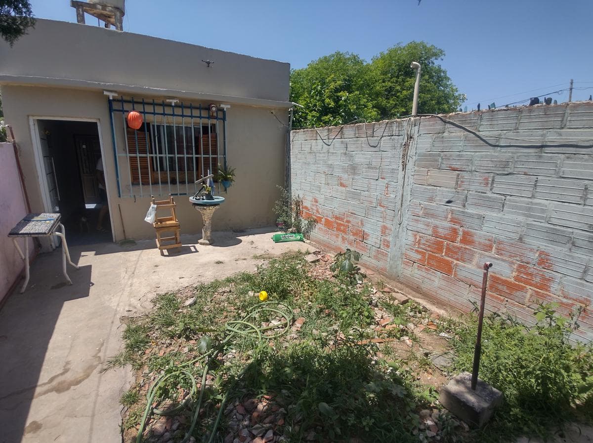 Masonry house with a ceramic tile roof in Gonzalez Catan