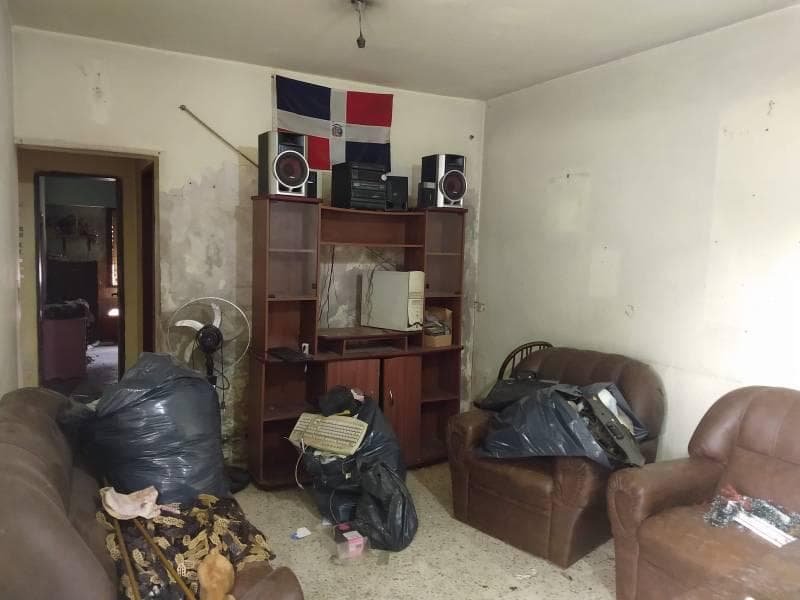 Spacious corner lot for sale with a garage and yard.