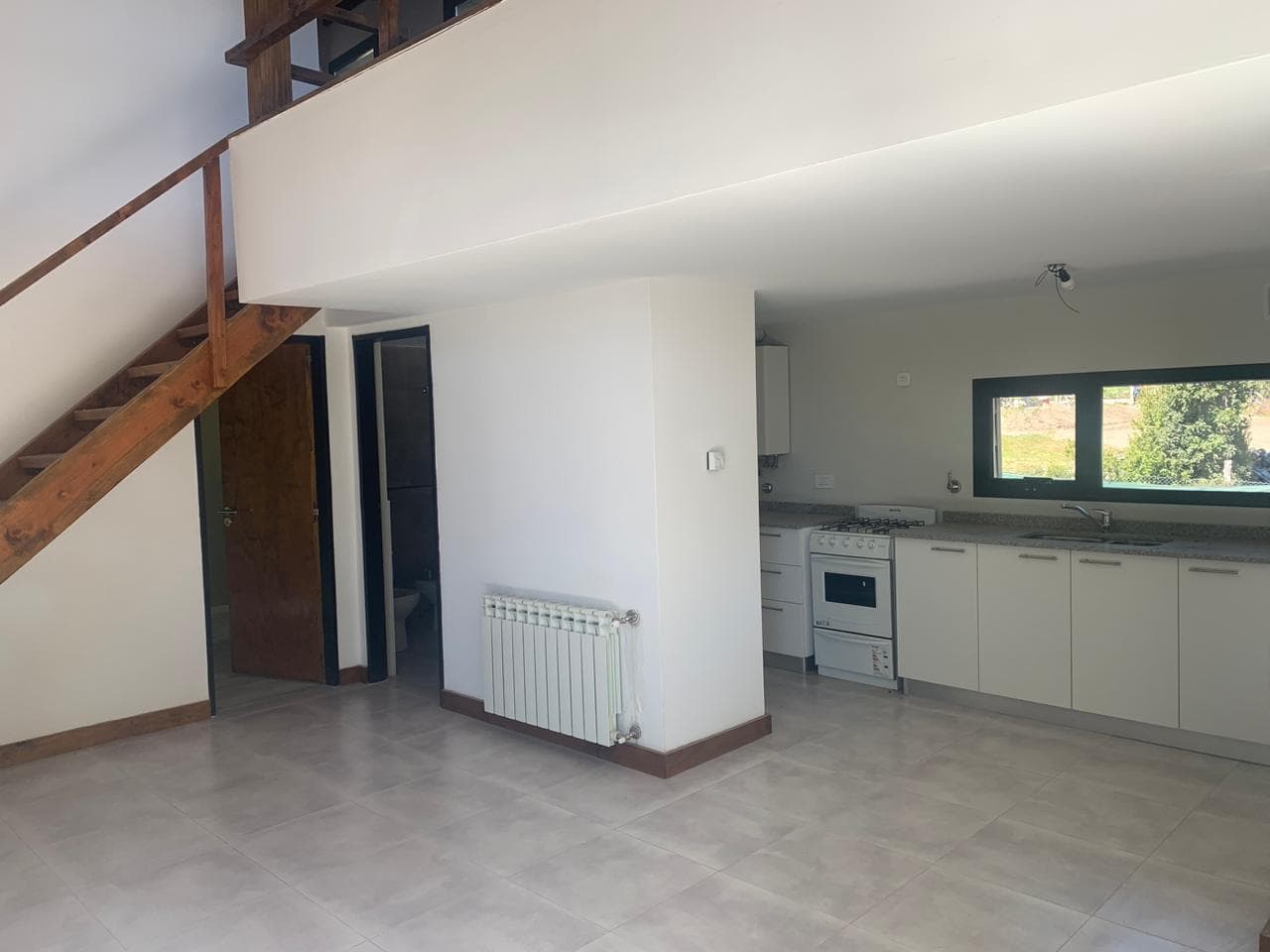 For sale: 3-room apartment on an upper floor with balcony and a 12-square-foot garage.