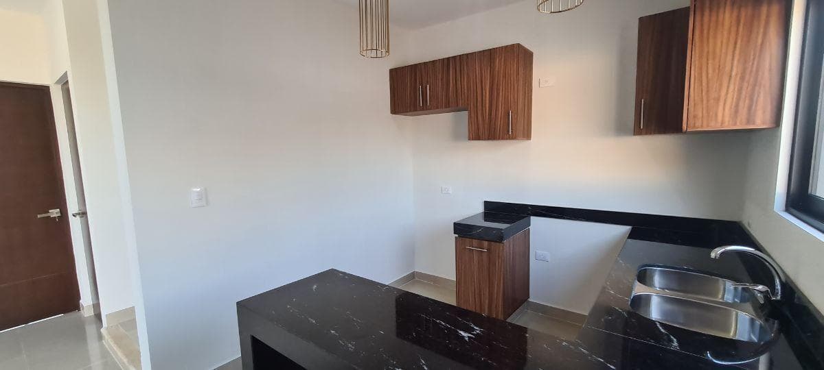 House in a gated community with a spacious patio in Conkal