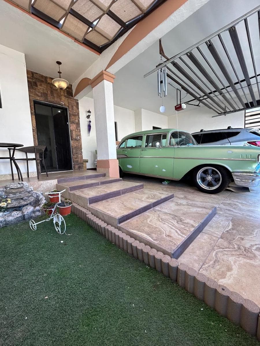 I am offering a two-story house for sale in Real De Quiroga