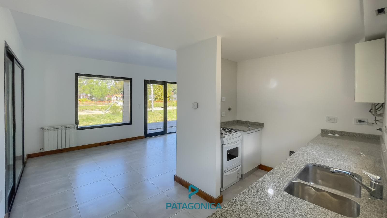 FOR SALE: 3-bedroom, 86 m² apartment with a quincho, deck, and ground-floor parking in Villa La Angostura.
