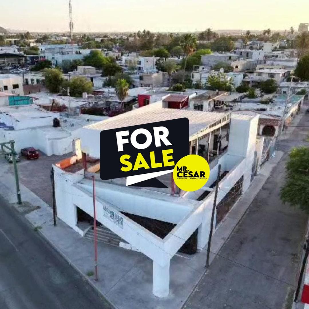 Land with a building in need of renovation for sale