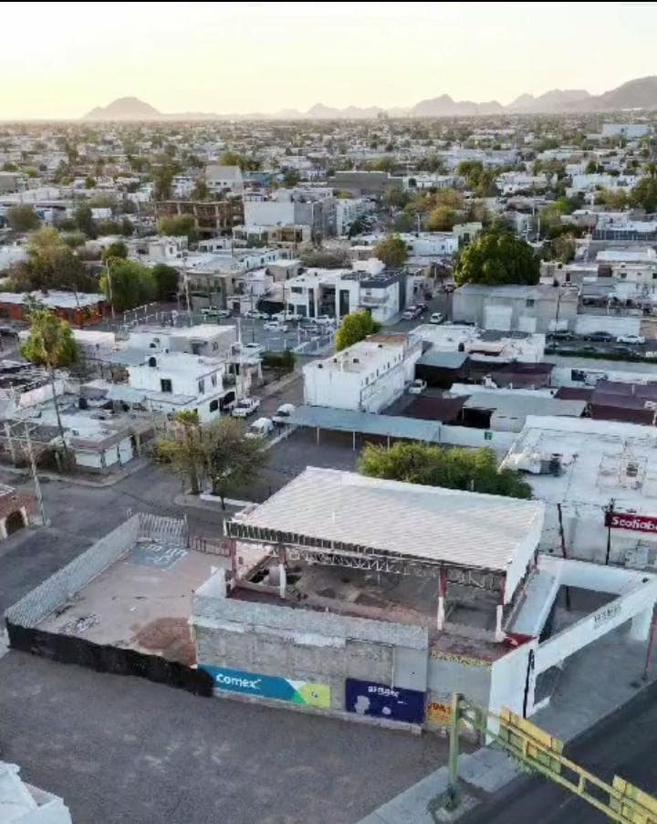 Land with a building in need of renovation for sale