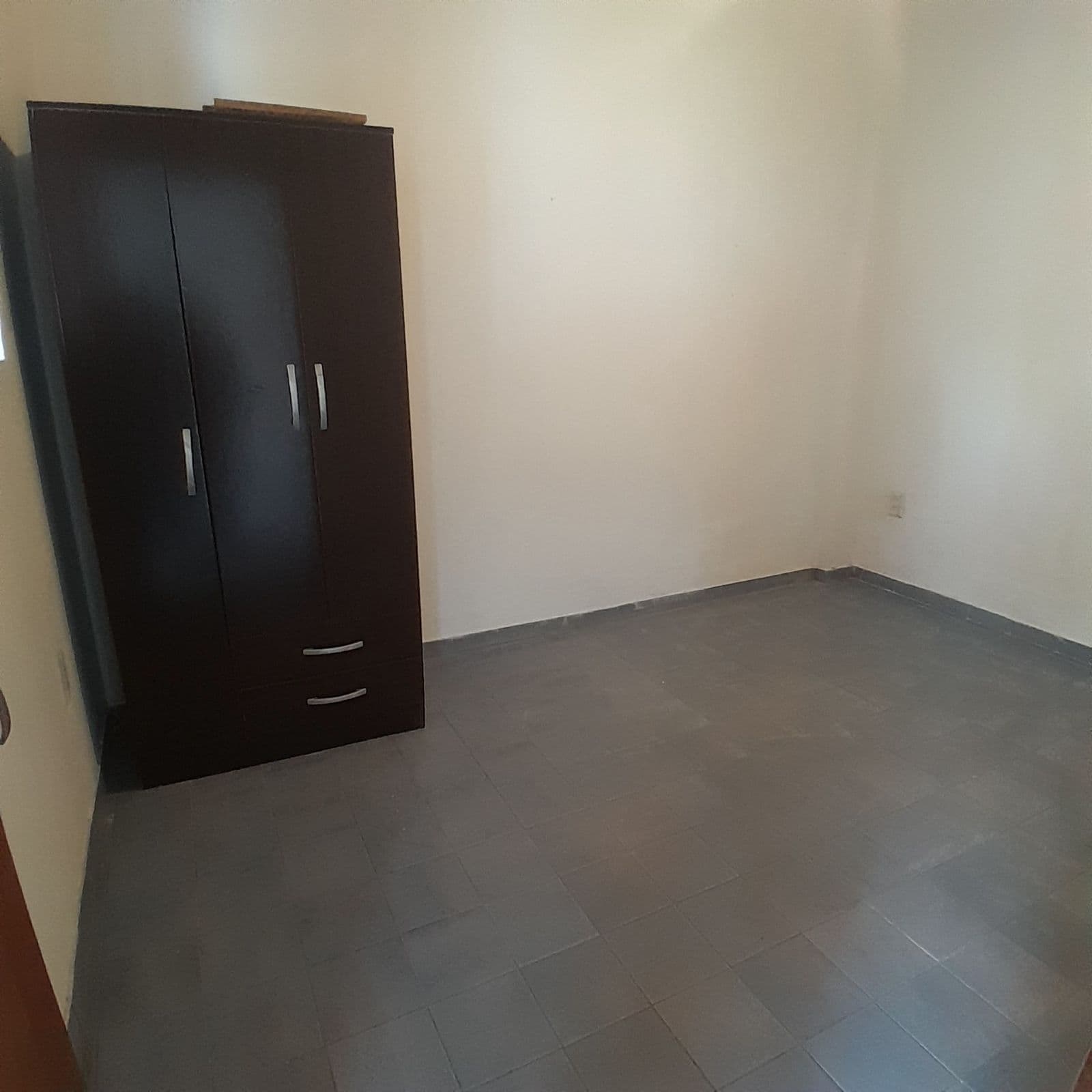 2-room townhouse for rent with no maintenance fees and a garden