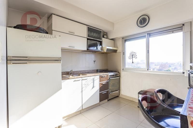 4-room duplex-style apartment for sale in Banfield with a garage