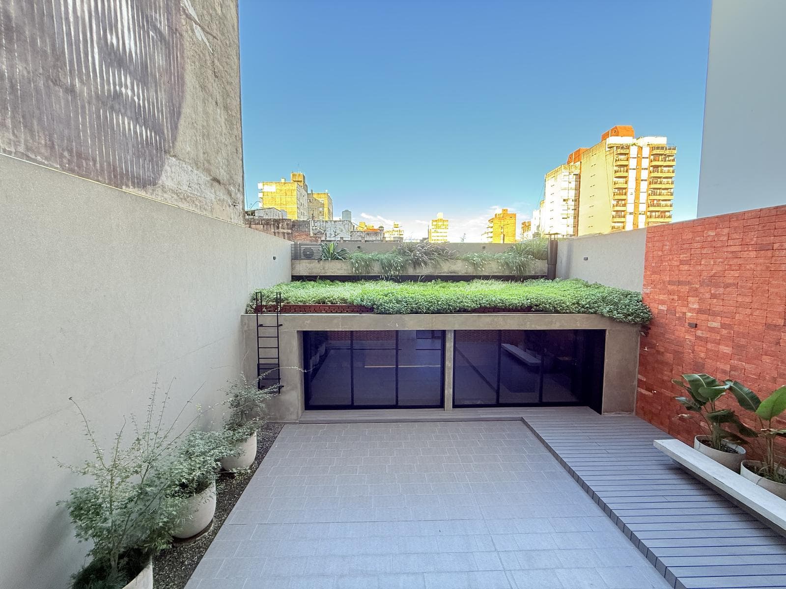 For Sale/Financing: Two-Bedroom Duplex Apartment with Private Terrace. Downtown