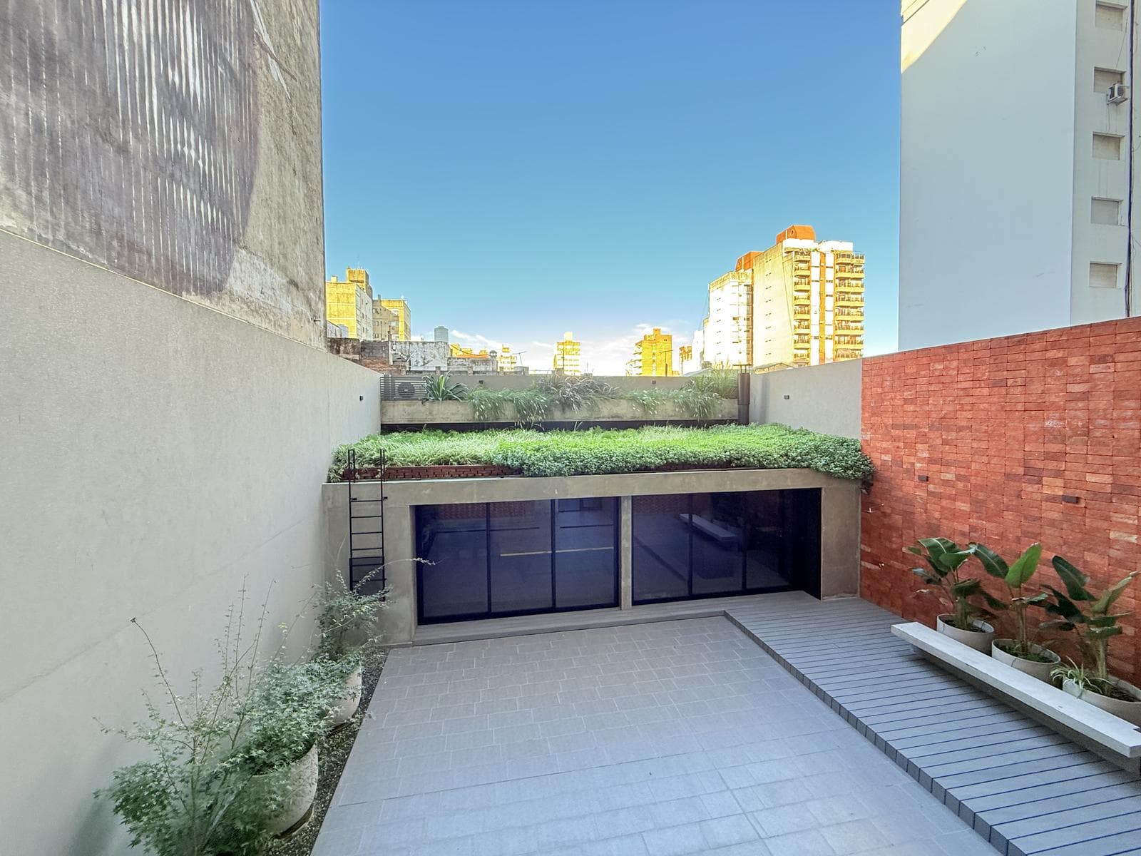 For Sale/Financing: Two-Bedroom Duplex Apartment with Private Terrace. Downtown