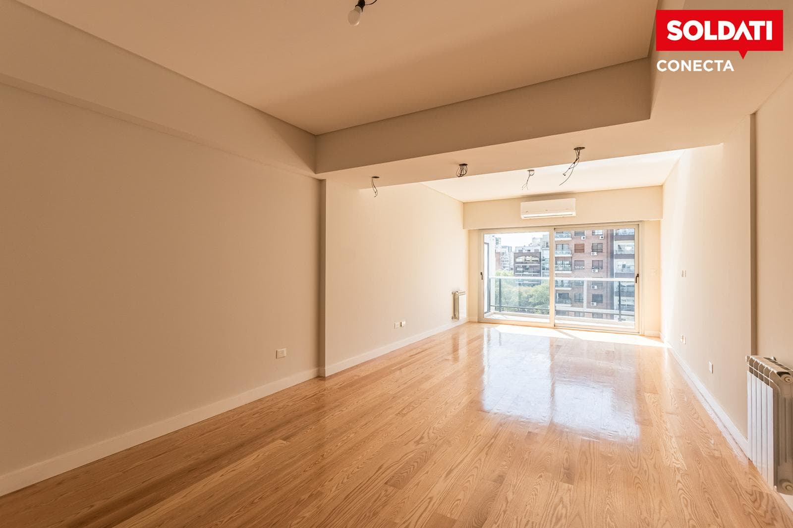 4-room apartment for sale, facing the rear of the building with a balcony, 2 parking spaces, and a storage room in Caballito