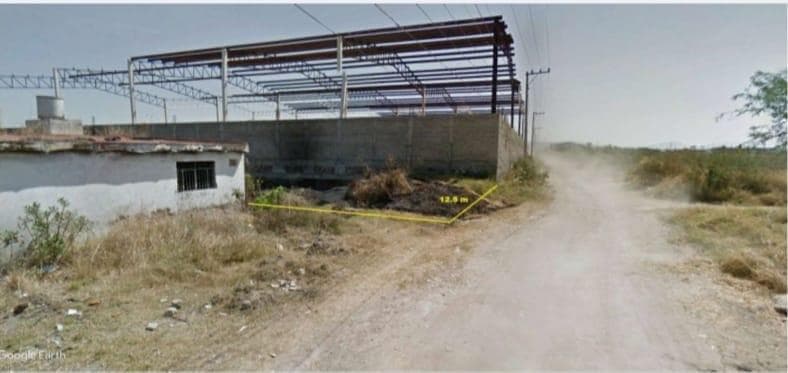 Land in Nuevo Periferico Oriente, near the airport.