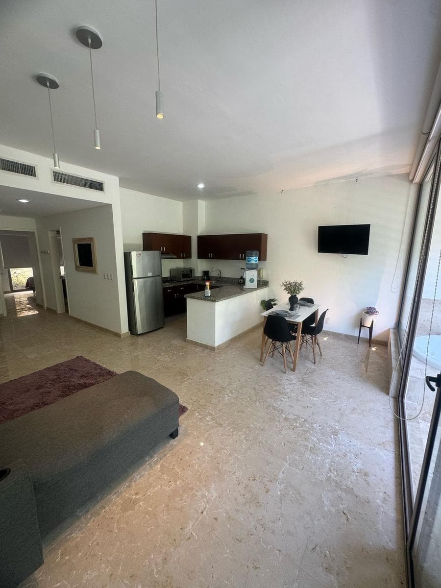 FURNISHED APARTMENT FOR SALE AT TULUM COUNTRY CLUB WITH A JACUZZI