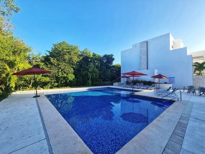 FURNISHED APARTMENT FOR SALE AT TULUM COUNTRY CLUB WITH A JACUZZI