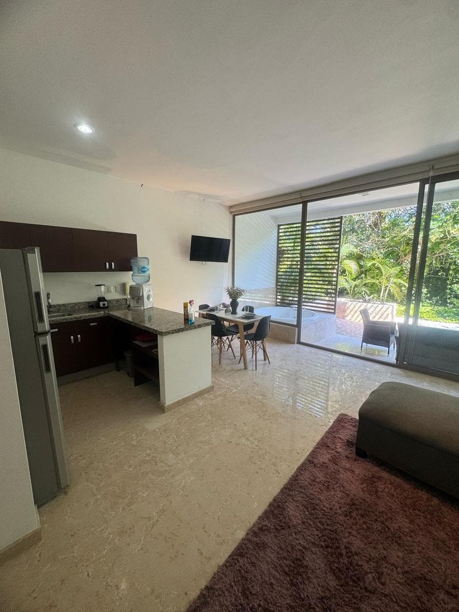 FURNISHED APARTMENT FOR SALE AT TULUM COUNTRY CLUB WITH A JACUZZI
