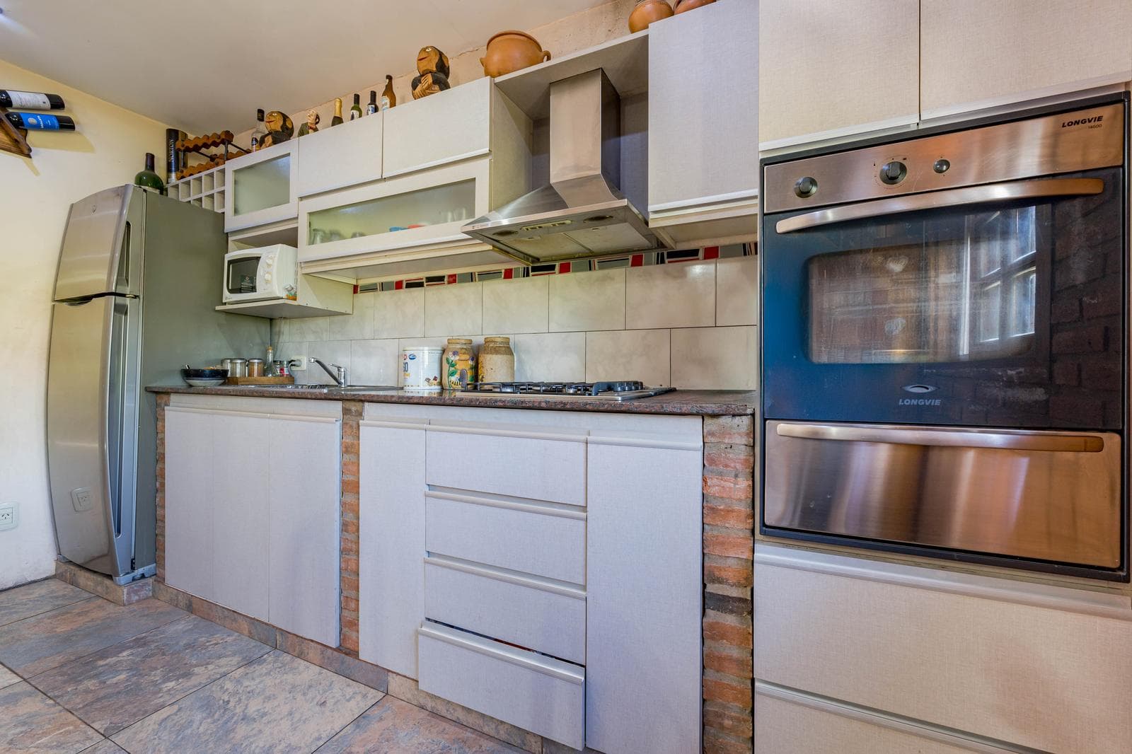 FOR SALE/TRADE - 3-bedroom house with a patio, barbecue area, and shed. Tiro Suizo, Rosario.