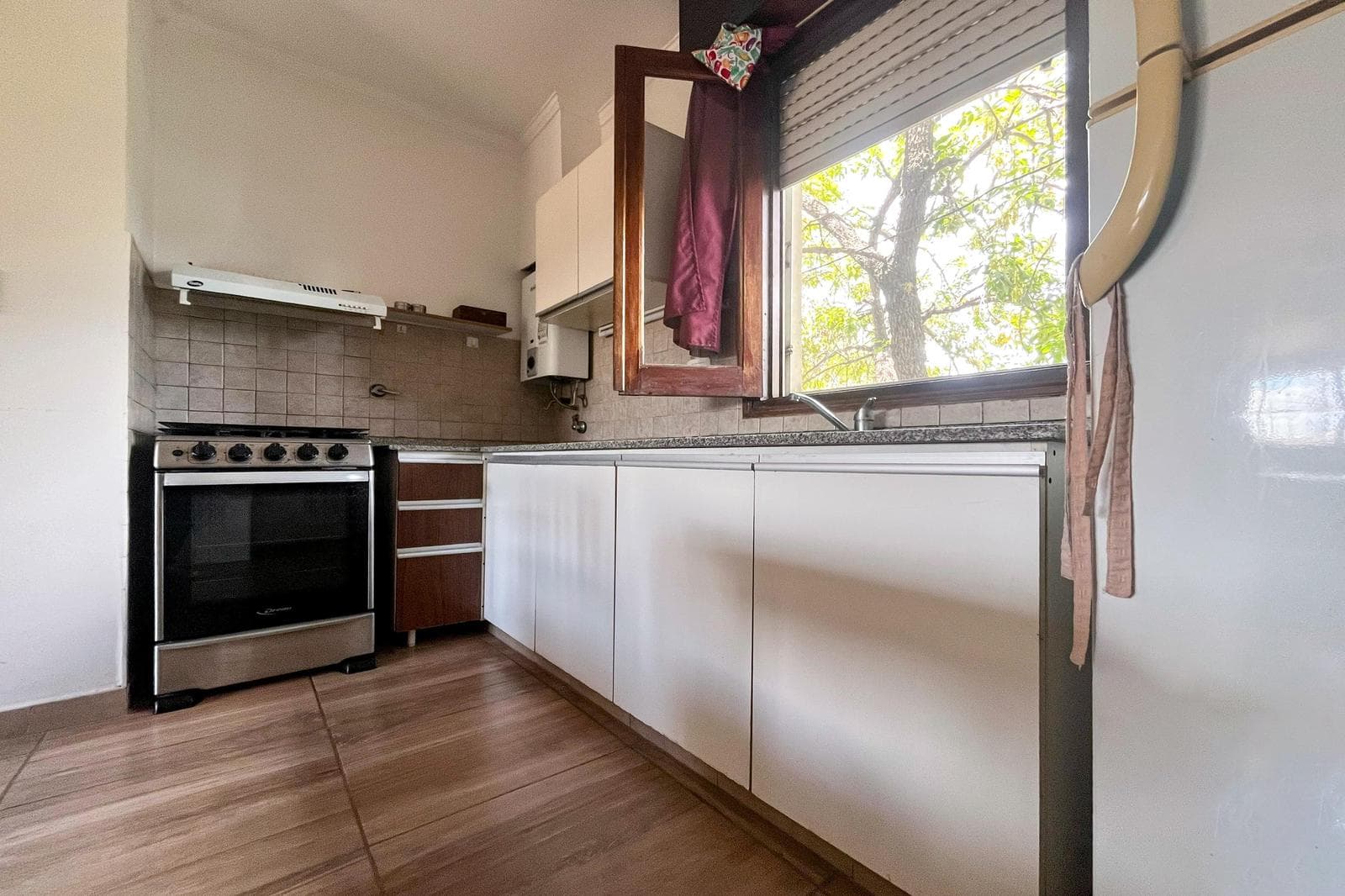 FOR SALE - 1-bedroom apartment with private laundry room - Matheu, Rosario. QUALIFIES FOR A MORTGAGE.