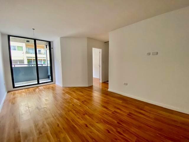 FOR SALE - 2-bedroom apartment with a patio - Downtown, Rosario.
