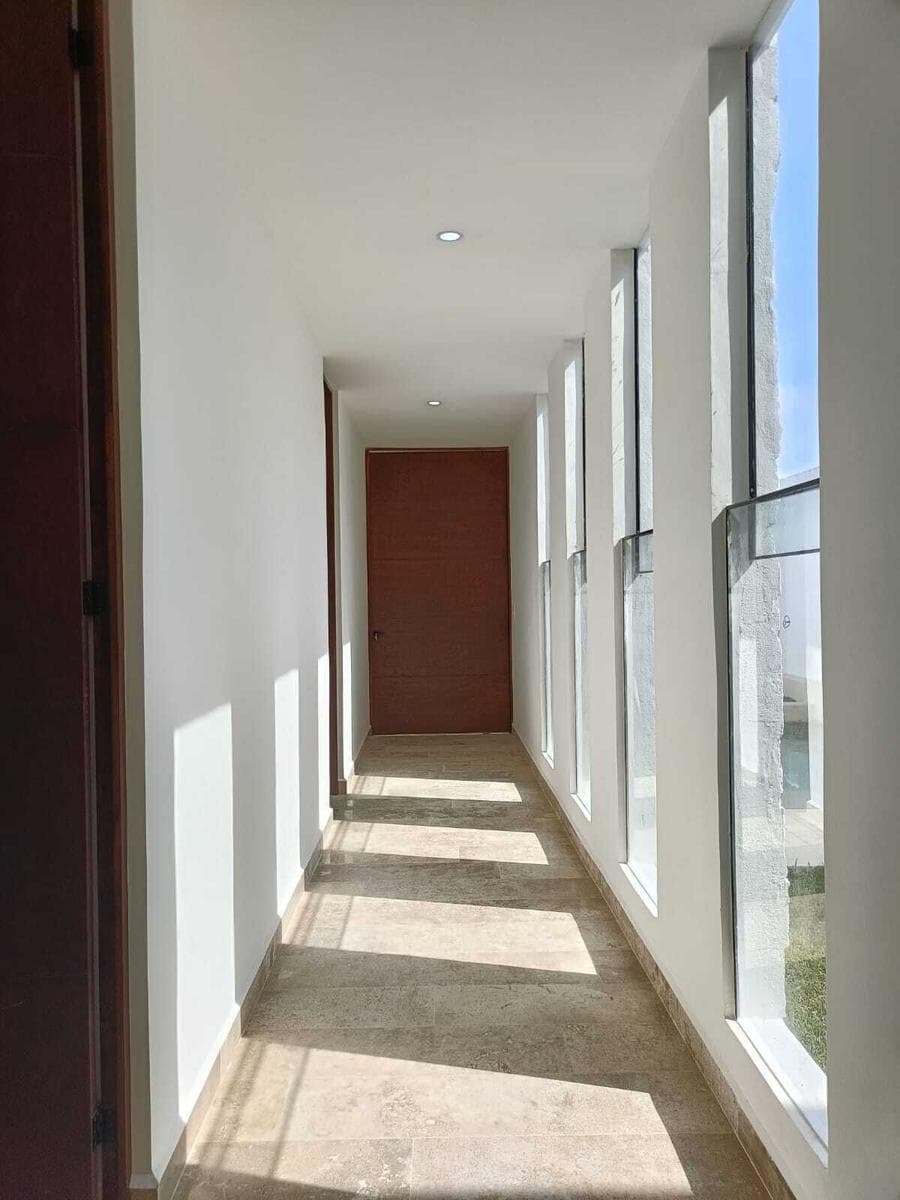 Single-story house with a double-height living room in Dzitya, Mérida