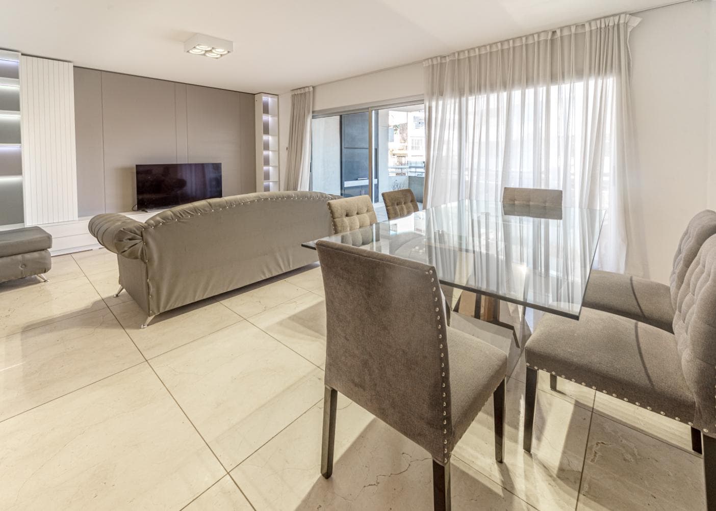 4-room apartment for sale with a balcony, terrace, garage, and barbecue area.